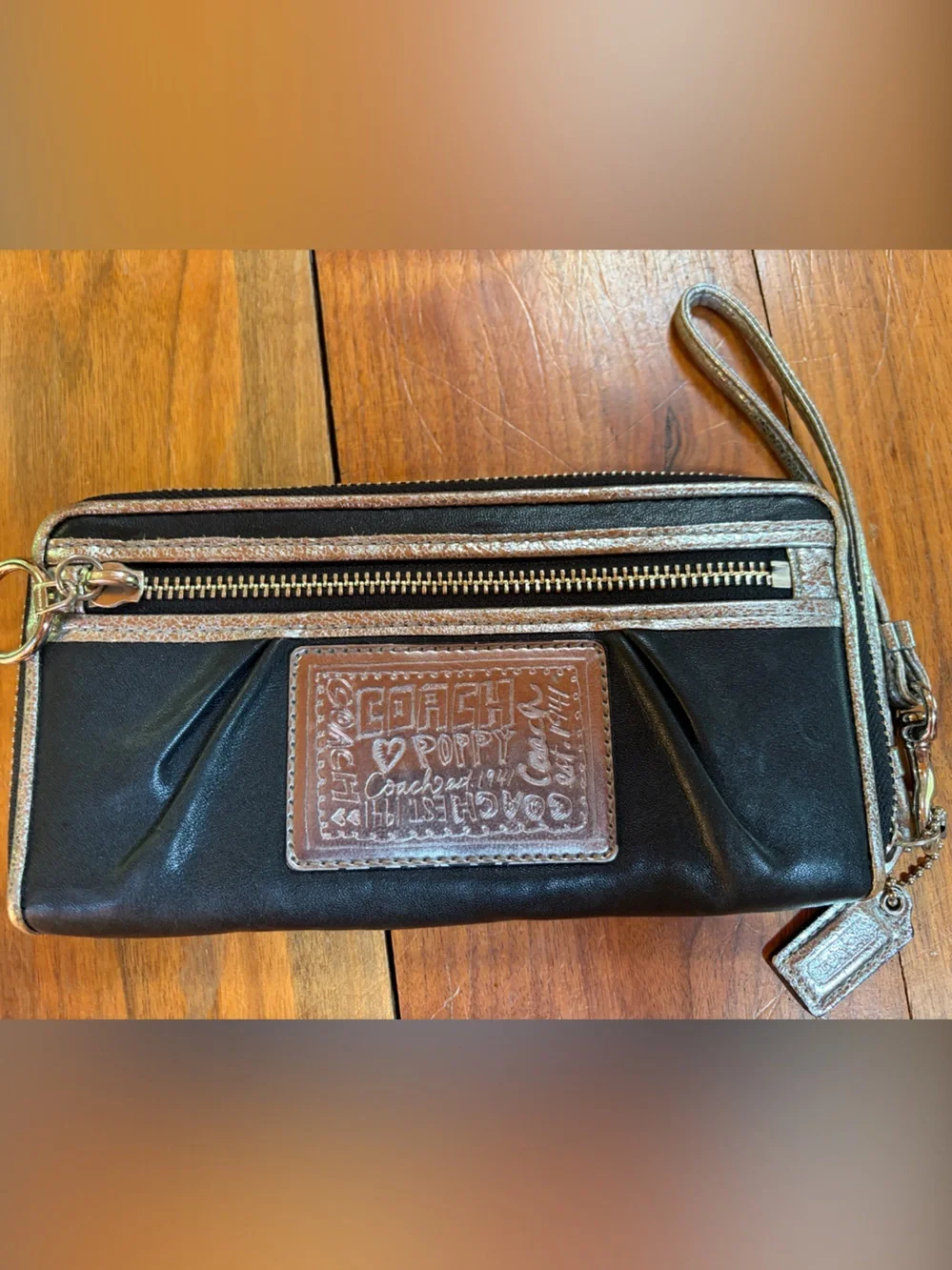 Coach sleek black